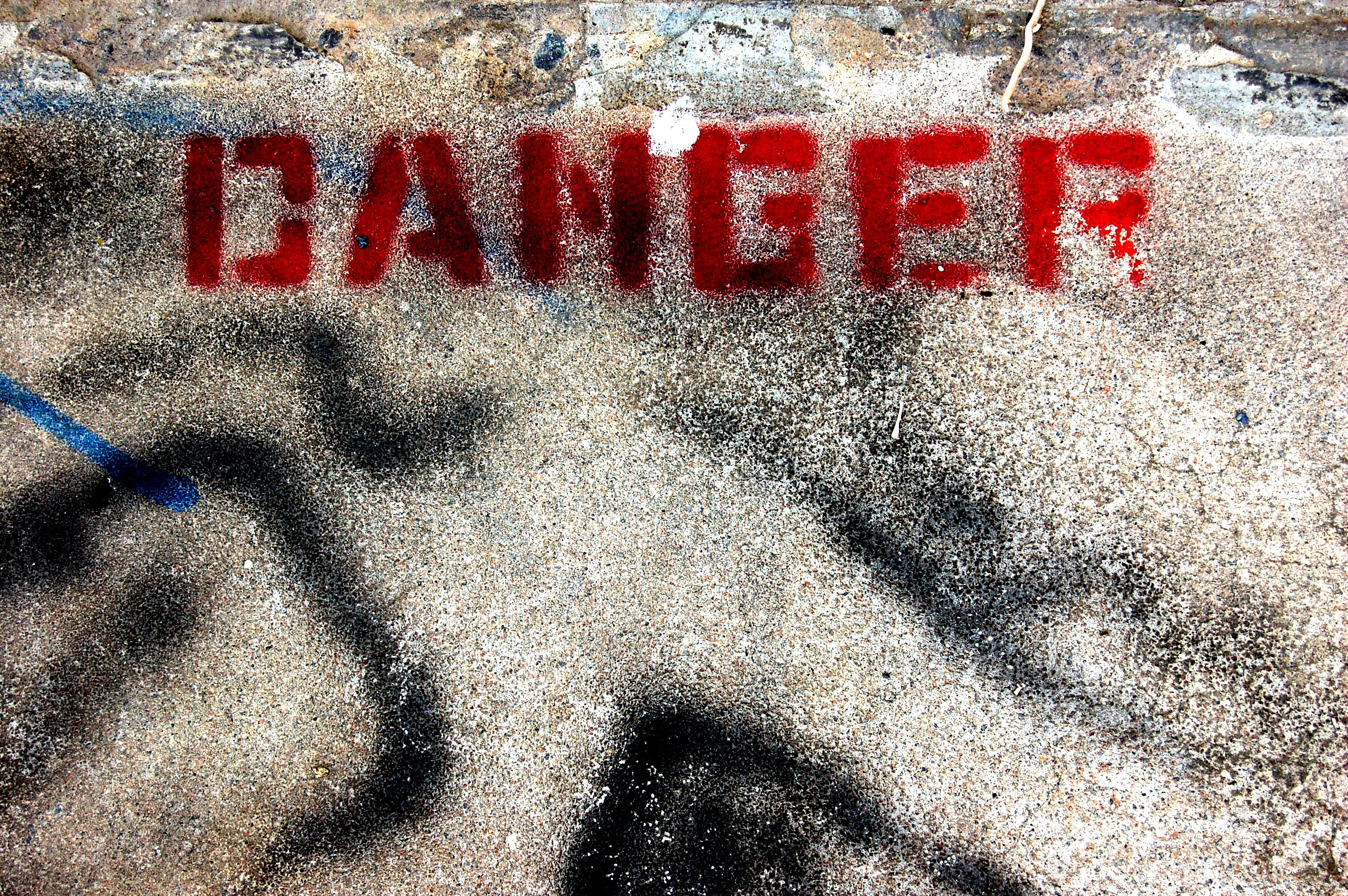 Stress Reponses - image of the word danger spray painted on concrete